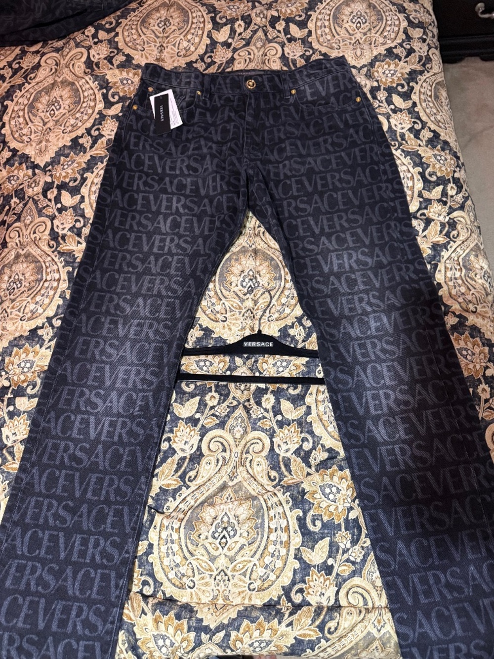Versace logo all over jeans